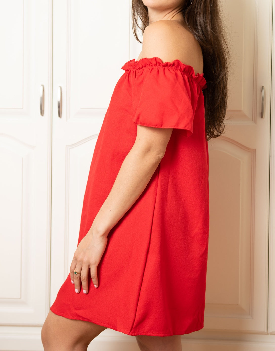 Side view of Off Shoulder Mini Dress.