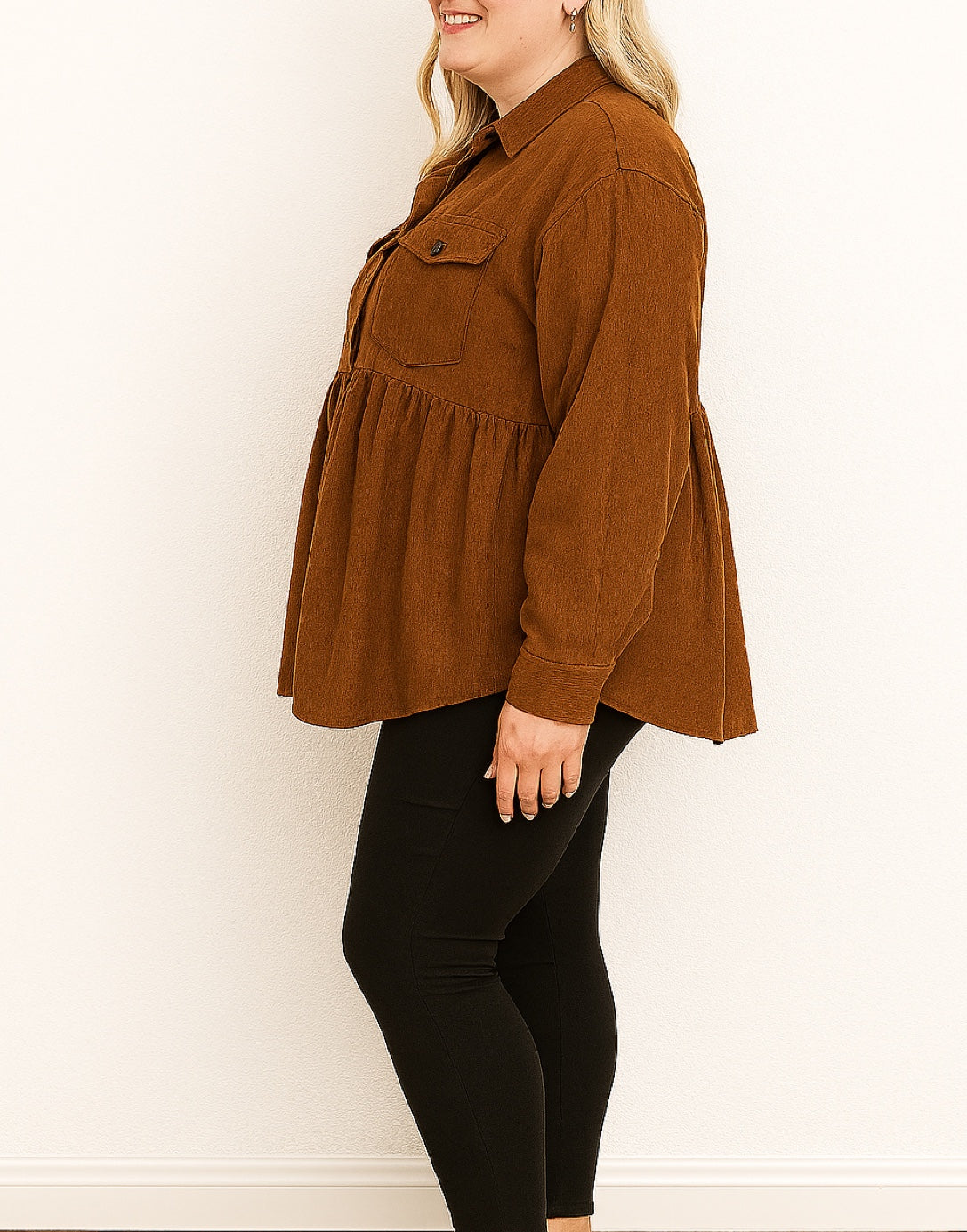 Side view of Plus Size Flap Pocket Drop Shoulder Peplum Shirt.