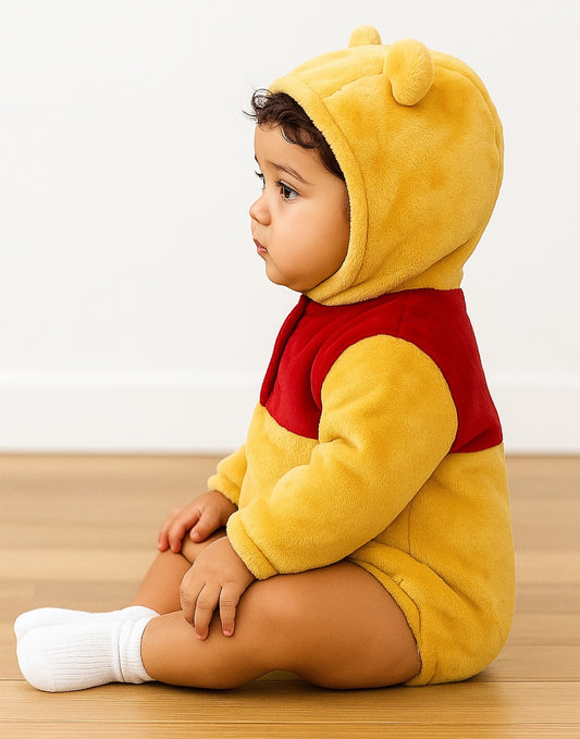 Side view of baby wearing a yellow 3D Ears Hooded Onesie Romper on a light background.