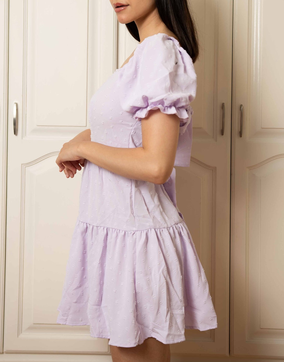 Side view of Back Tie Puff Sleeve Mini Dress.