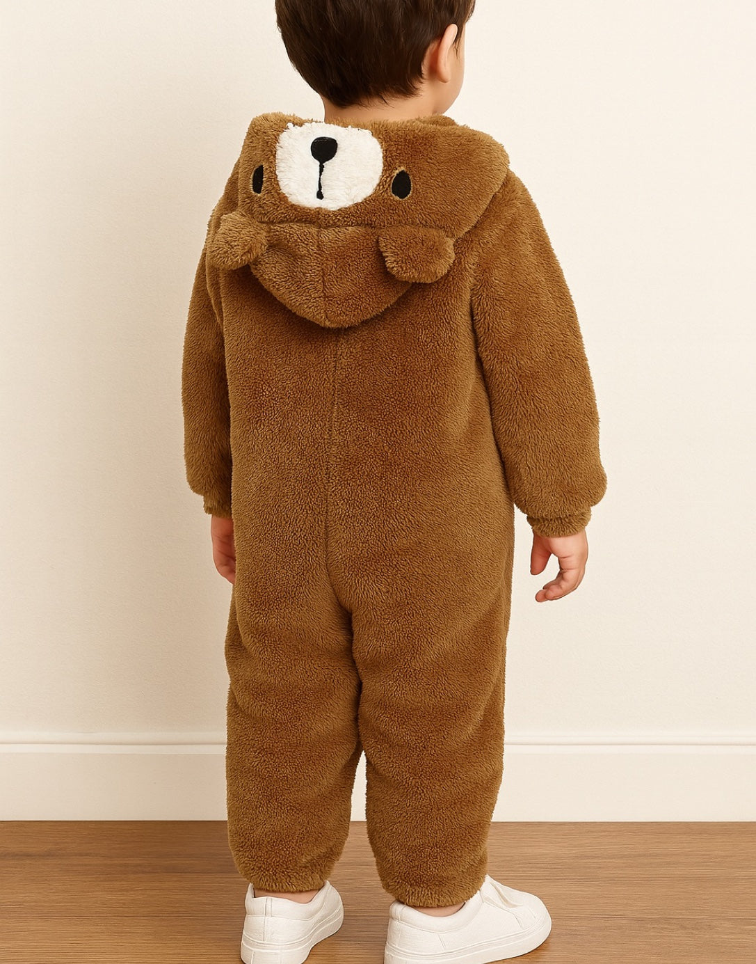 Back view of child wearing a brown Boys 3D Ear Hooded Jumpsuit against a plain background