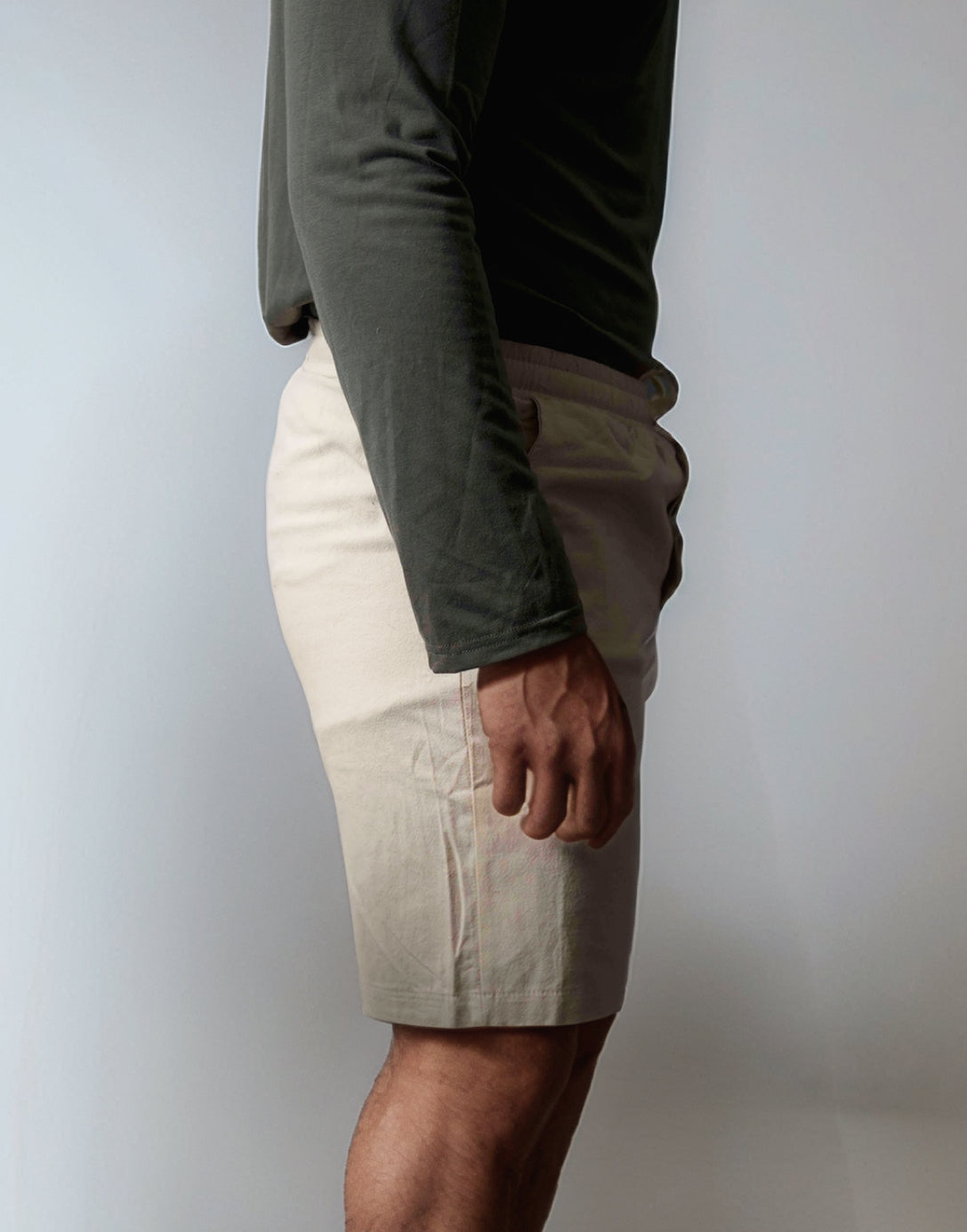Side view of Drawstring Button Front Shorts.