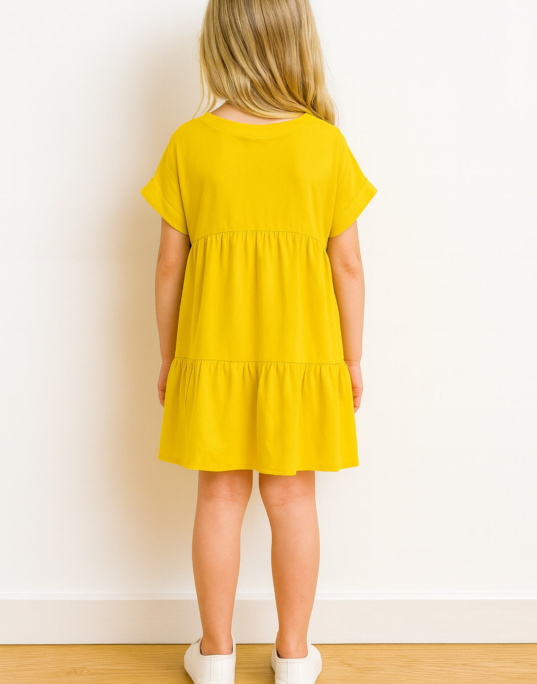 Back view of Girls Gathered Smock Dress.