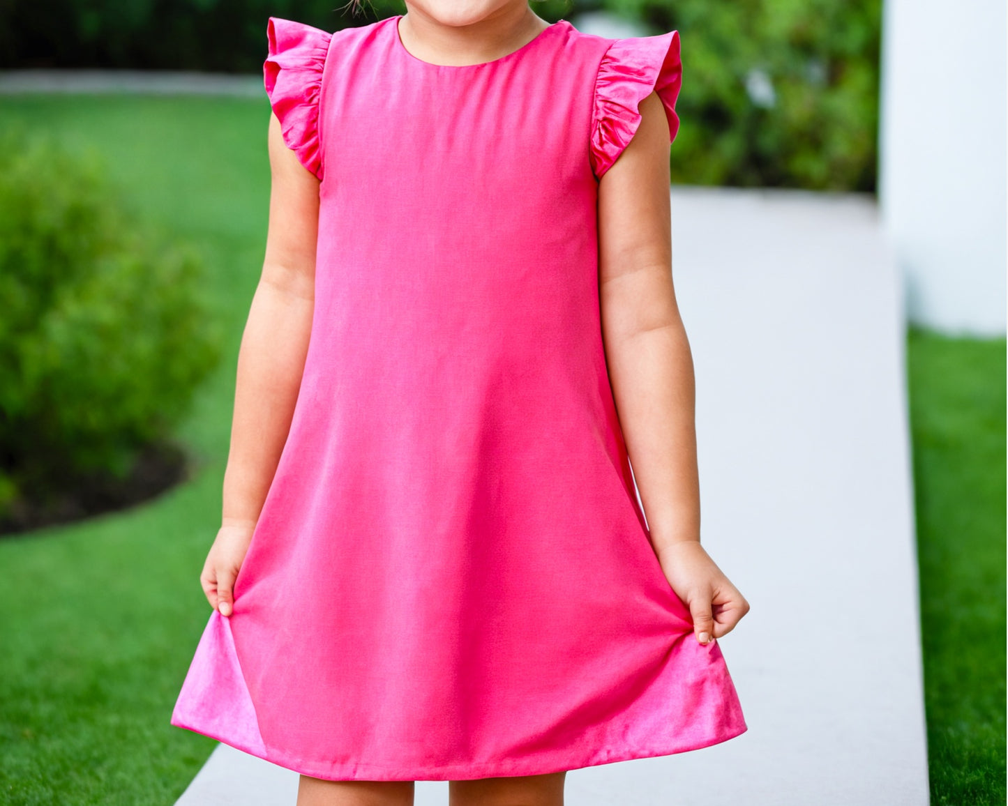 Front view of Girls Ruffle Sleeve A-Line Dress.