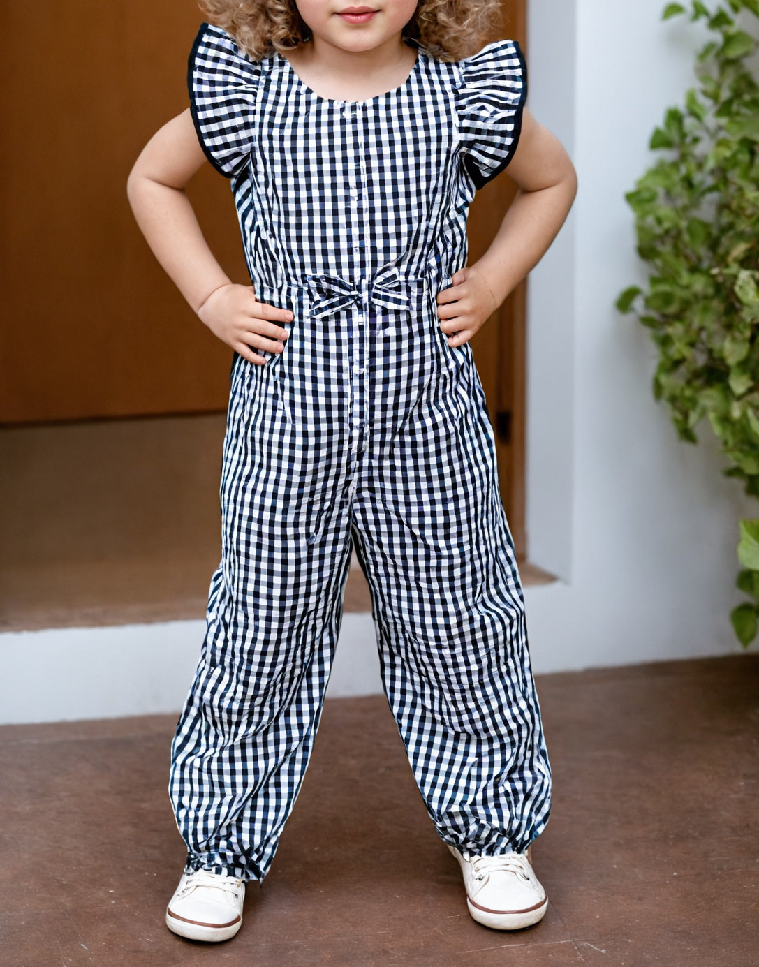 Full shot of of Girls Ruffle Sleeve Jumpsuit