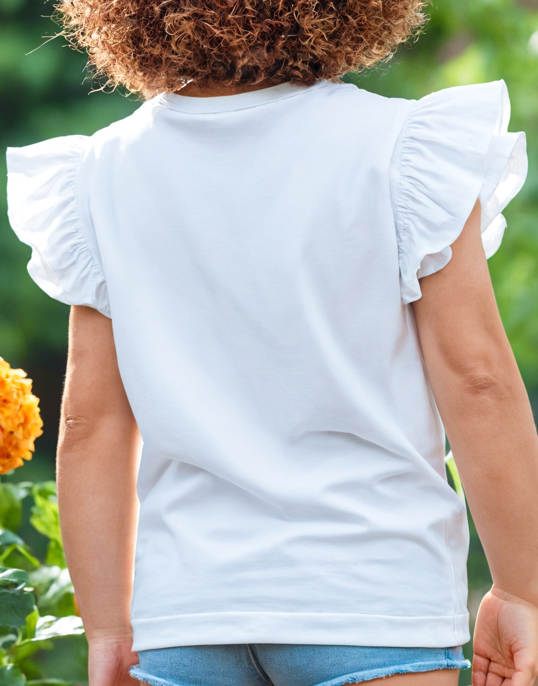 Back view of Girls Ruffle Tee.