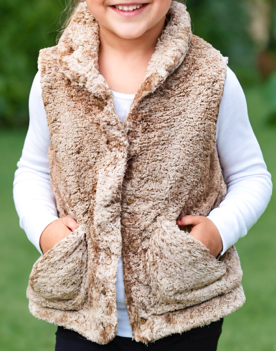 Side view of Girls Teddy Vest.