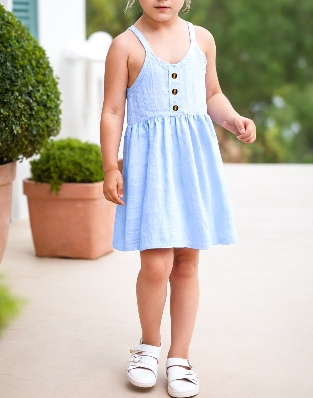 Side view of Girls V-Neck Spaghetti Strap Cami Dress.