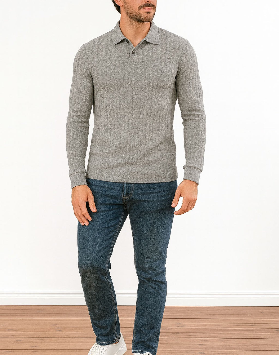 Man wearing a gray ribbed Long Sleeve Polo Shirt and blue jeans on a white background