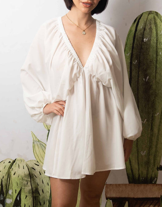 Front view of Plunging Neck Lantern Sleeve Smock Dress.