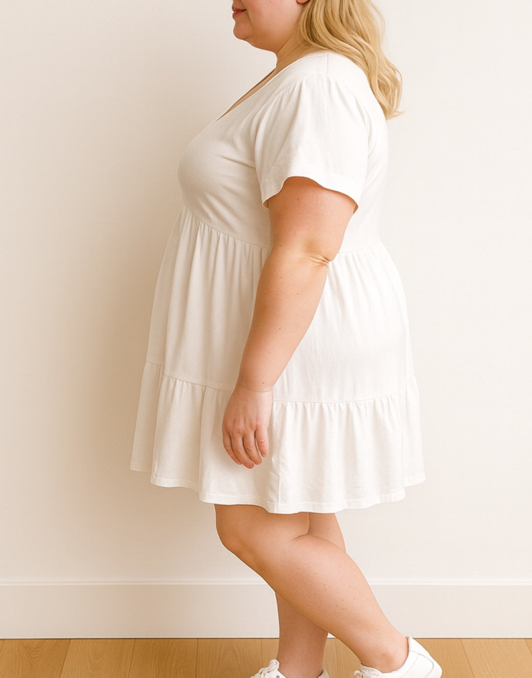 Side view of Plus Size Gathered Smock Dress.
