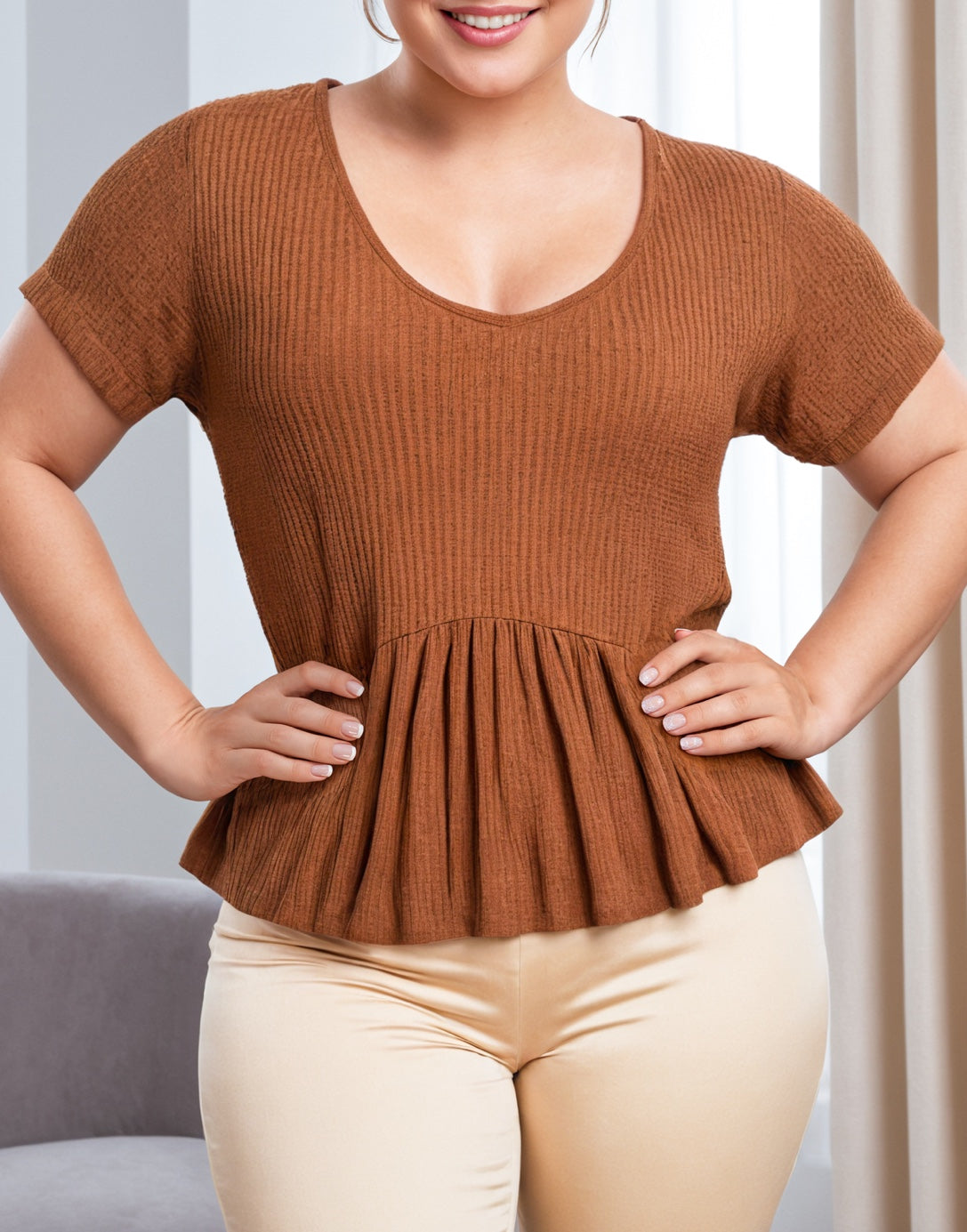 Side view of Plus Size Knit Peplum Top.