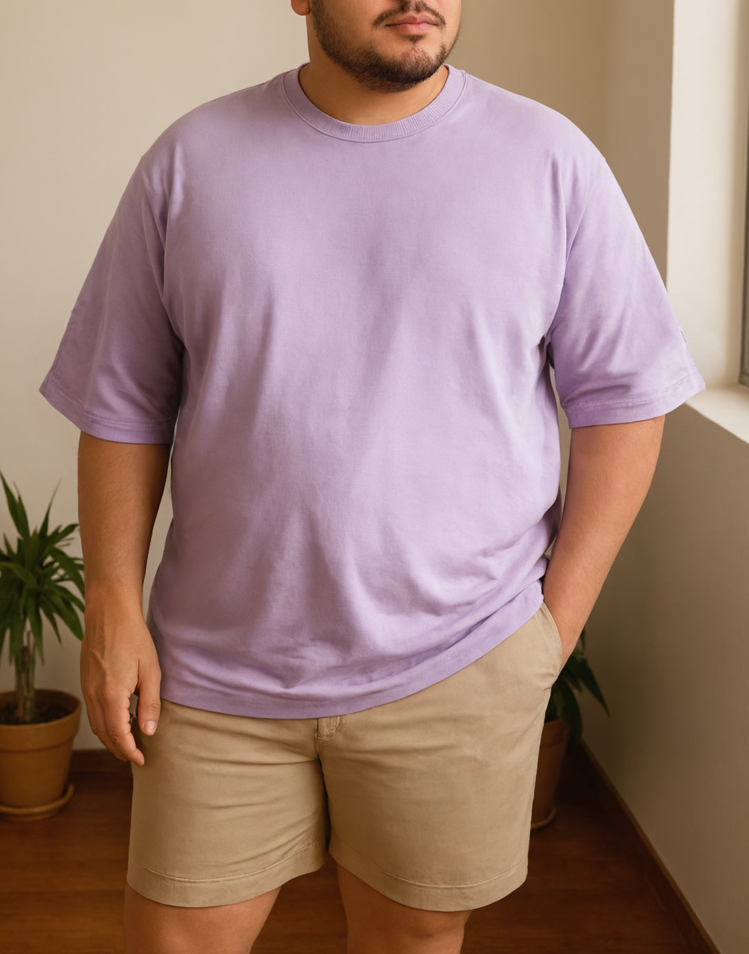 Side view of Plus Size Mens Oversized Longline Tee.