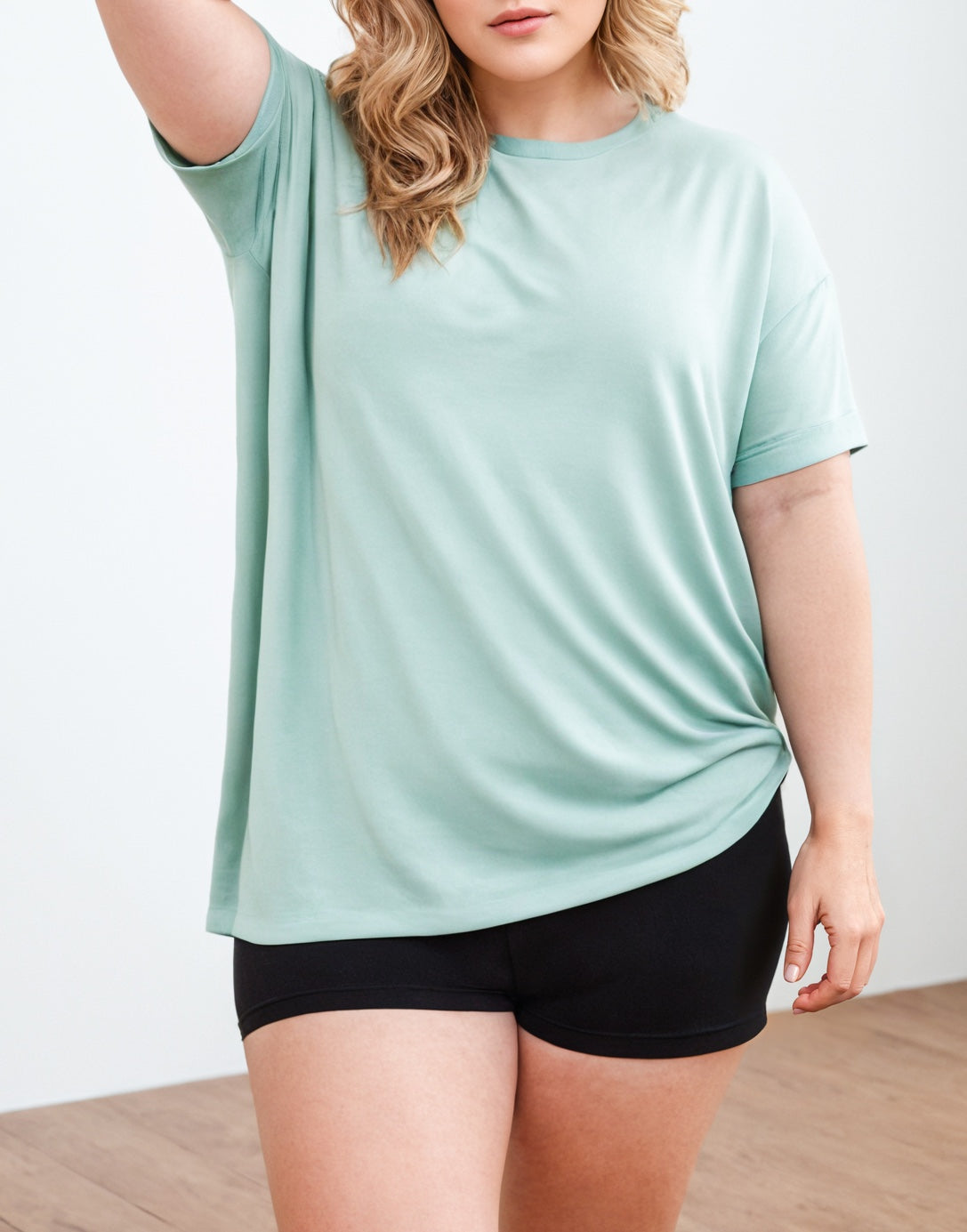 Side view of Plus Size Oversized Crew Neck T-Shirt.