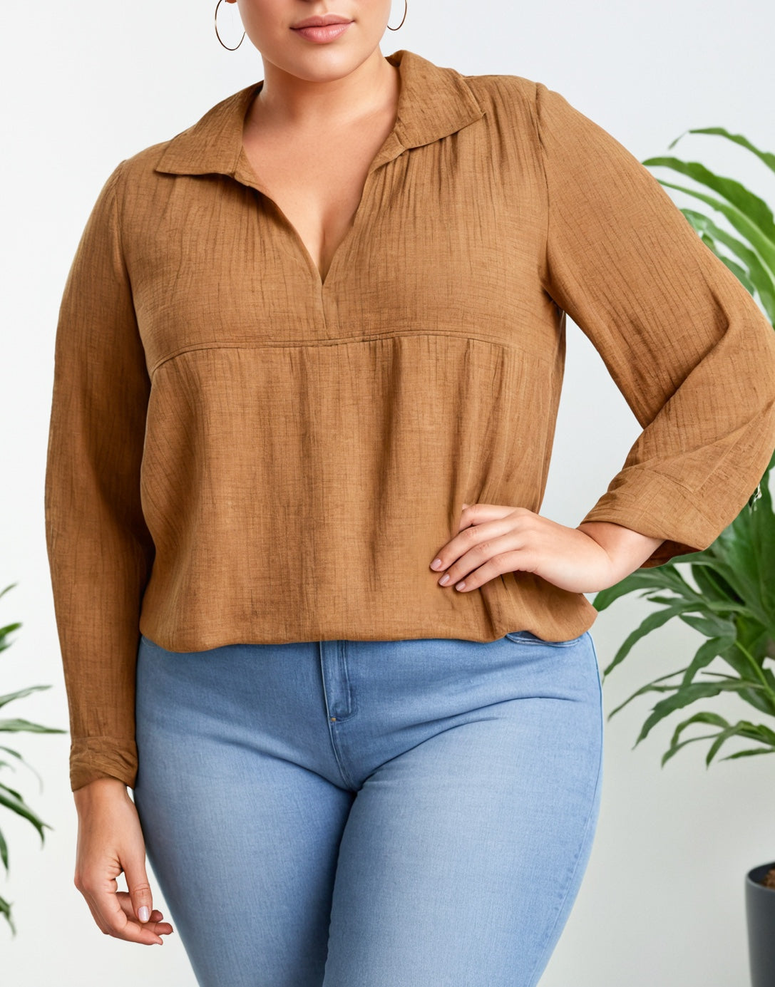 Side view of Plus Size V-Neck Gathered Babydoll Blouse.