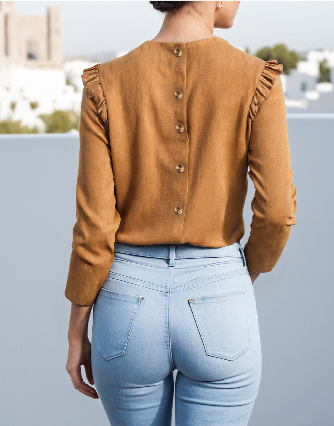 Back view of Ruffle Trim Button Back Blouse.