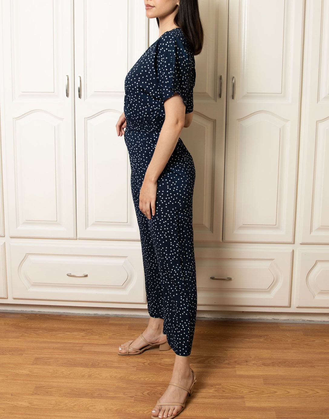 Side view of Surplice Jumpsuit.