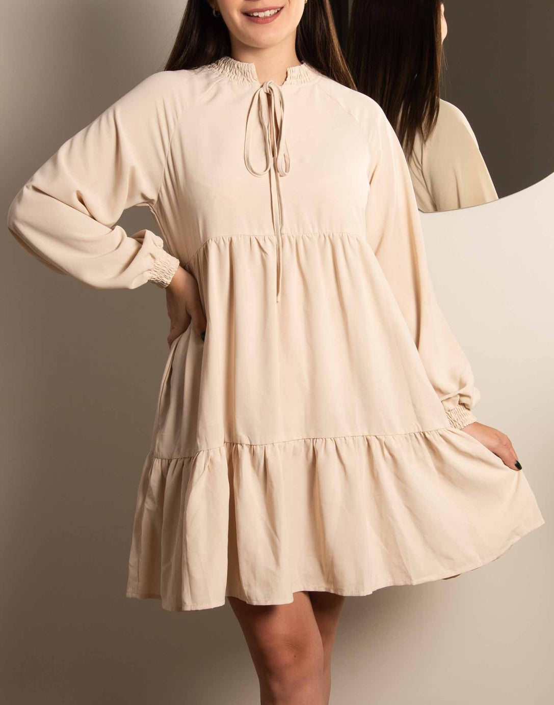 Full length photo of Tie Neck Smock Mini Dress.