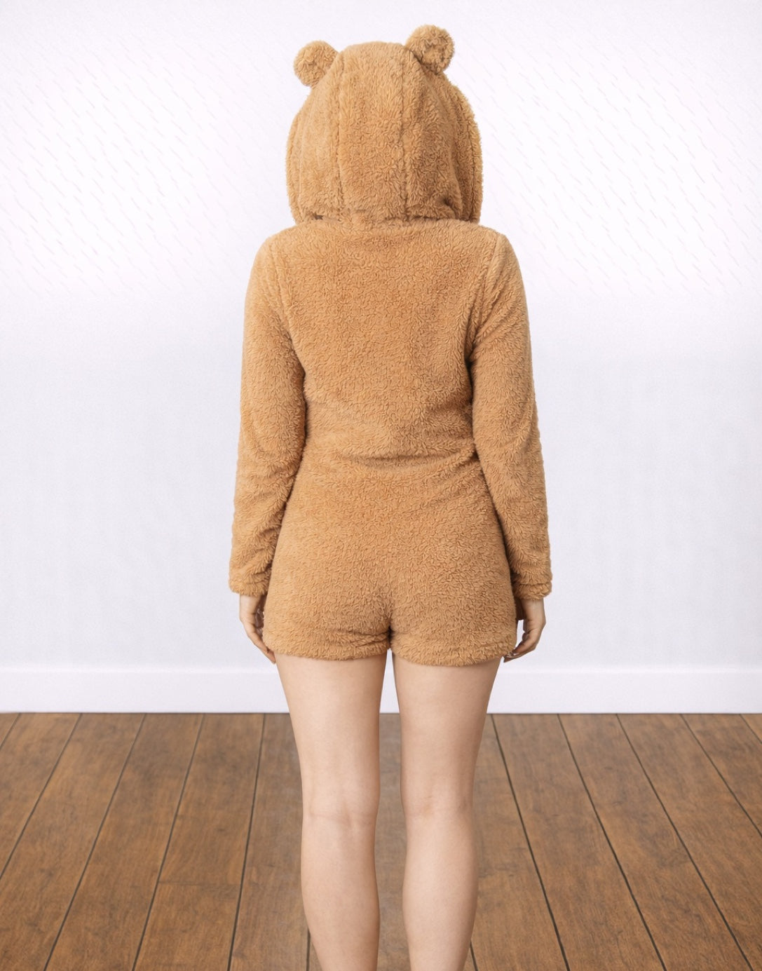 Back view of woman wearing a brown 3D Ears Hooded Sleepwear Romper against a white background.