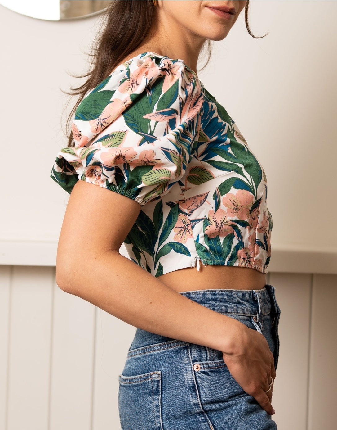 Side view of One Shoulder Puff Sleeve Crop Top. 