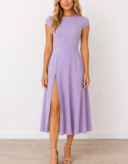 Woman wearing a purple Cap Sleeve Midi Dress with a slit on a white background