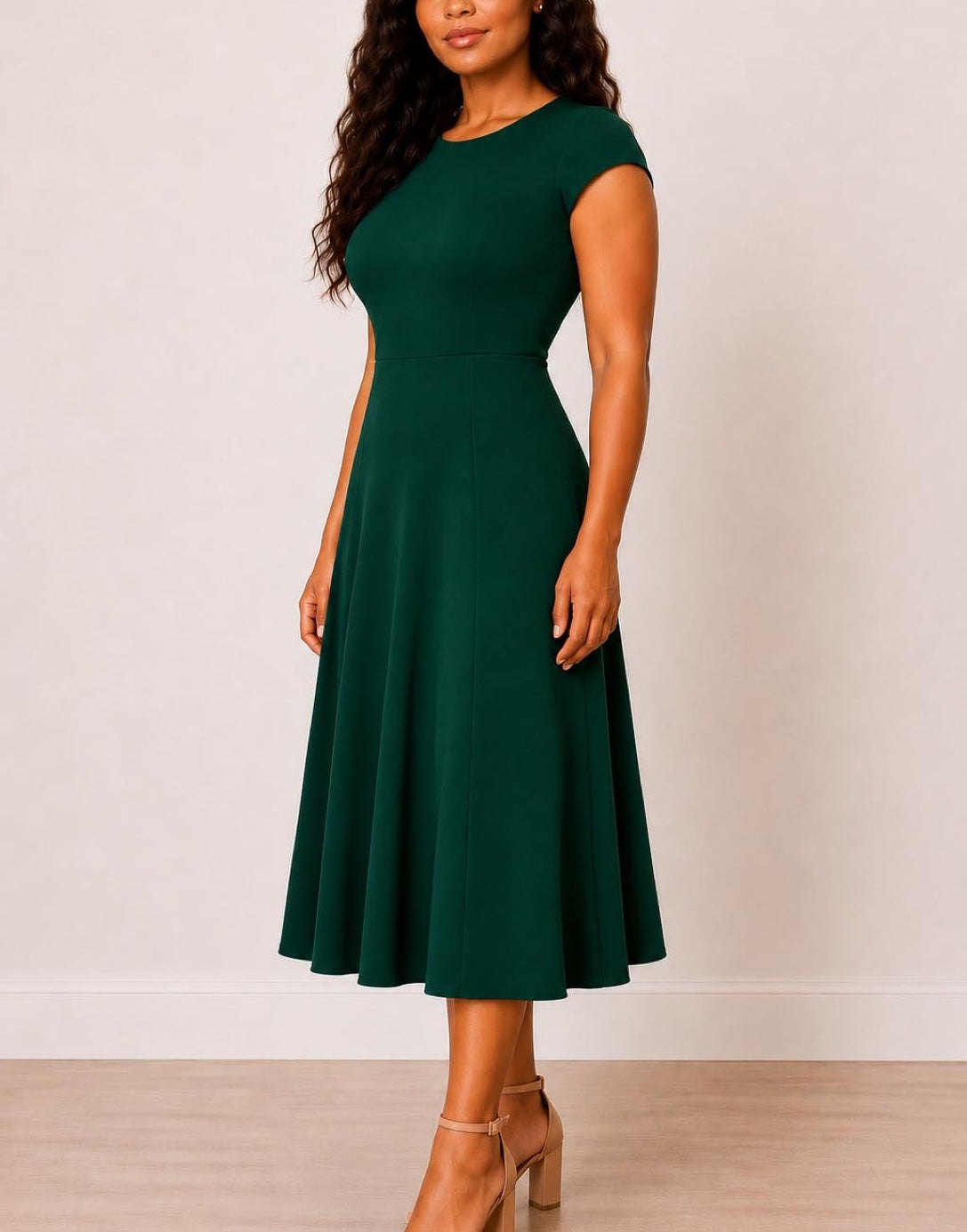 Side view of woman wearing a green Plus Size Cap Sleeve Midi Dress on a white background.