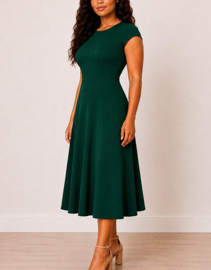 Side view of woman wearing a green Plus Size Cap Sleeve Midi Dress on a white background.