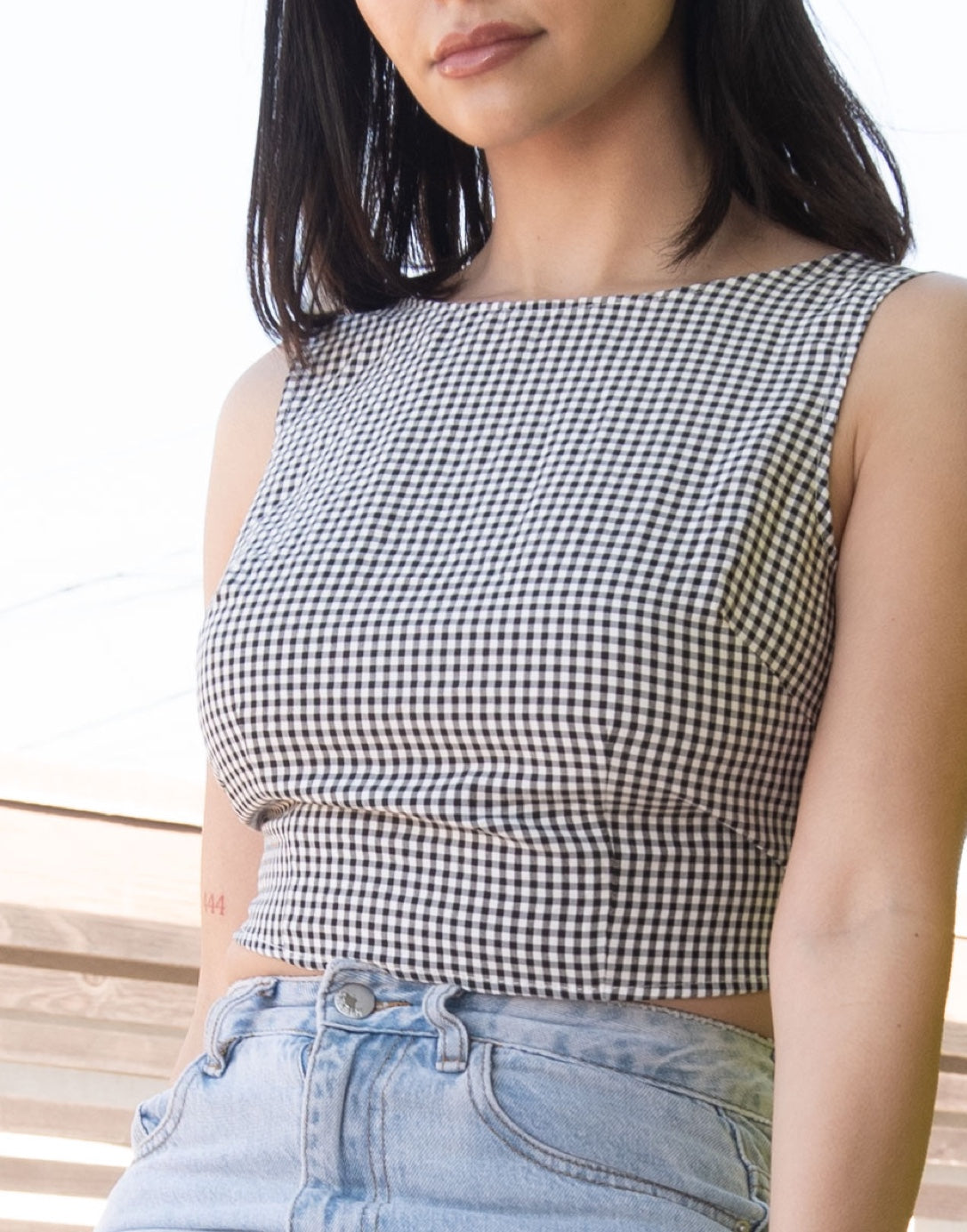 Front view of Tie Back Sleeveless Crop Top.