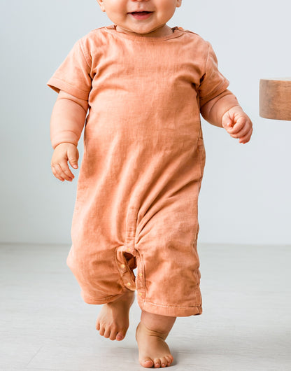 Side view of Baby Crew Neck T-Shirt Romper.