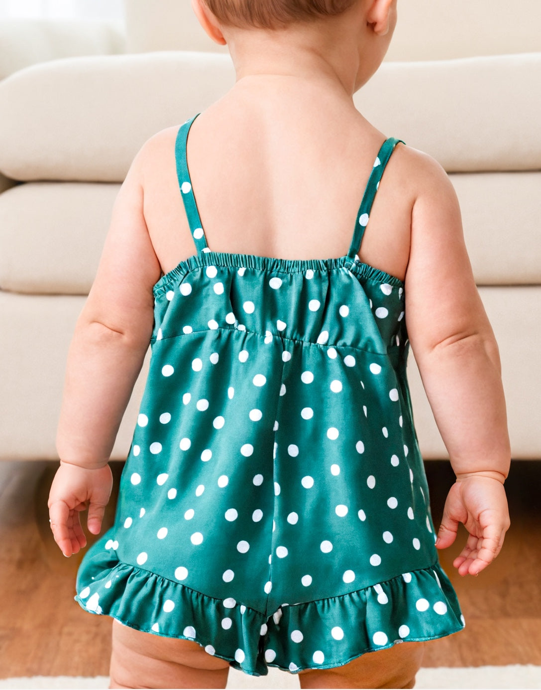 Back view of Baby Girl Cami Ruffle Hem Romper.