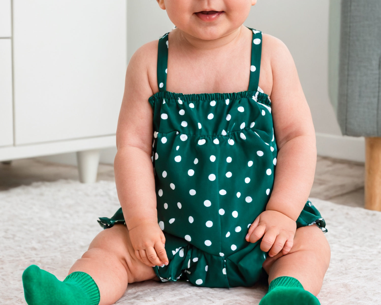 Front view of Baby Girl Cami Ruffle Hem Romper.