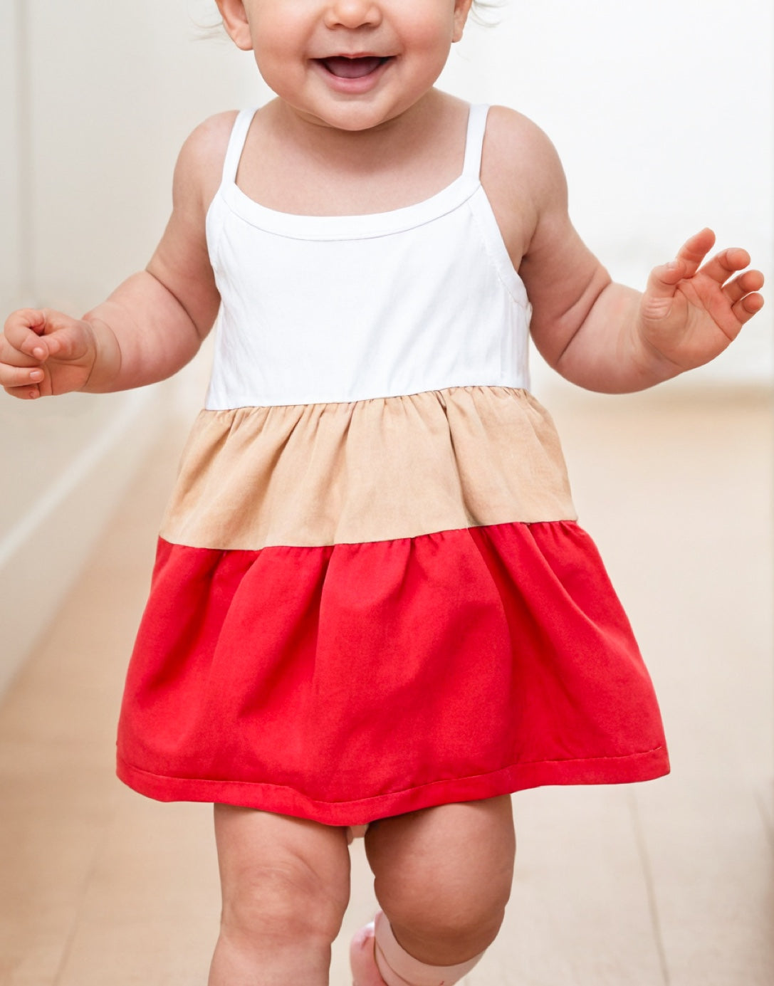 Front view of Baby Girl Colorblock Ruffle Hem Cami Dress.