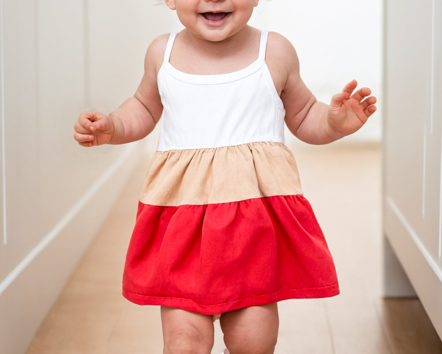 Front view of Baby Girl Colorblock Ruffle Hem Cami Dress.