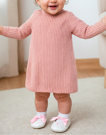 Side view of Baby Girl Long Sleeve Turtleneck Sweater Dress.