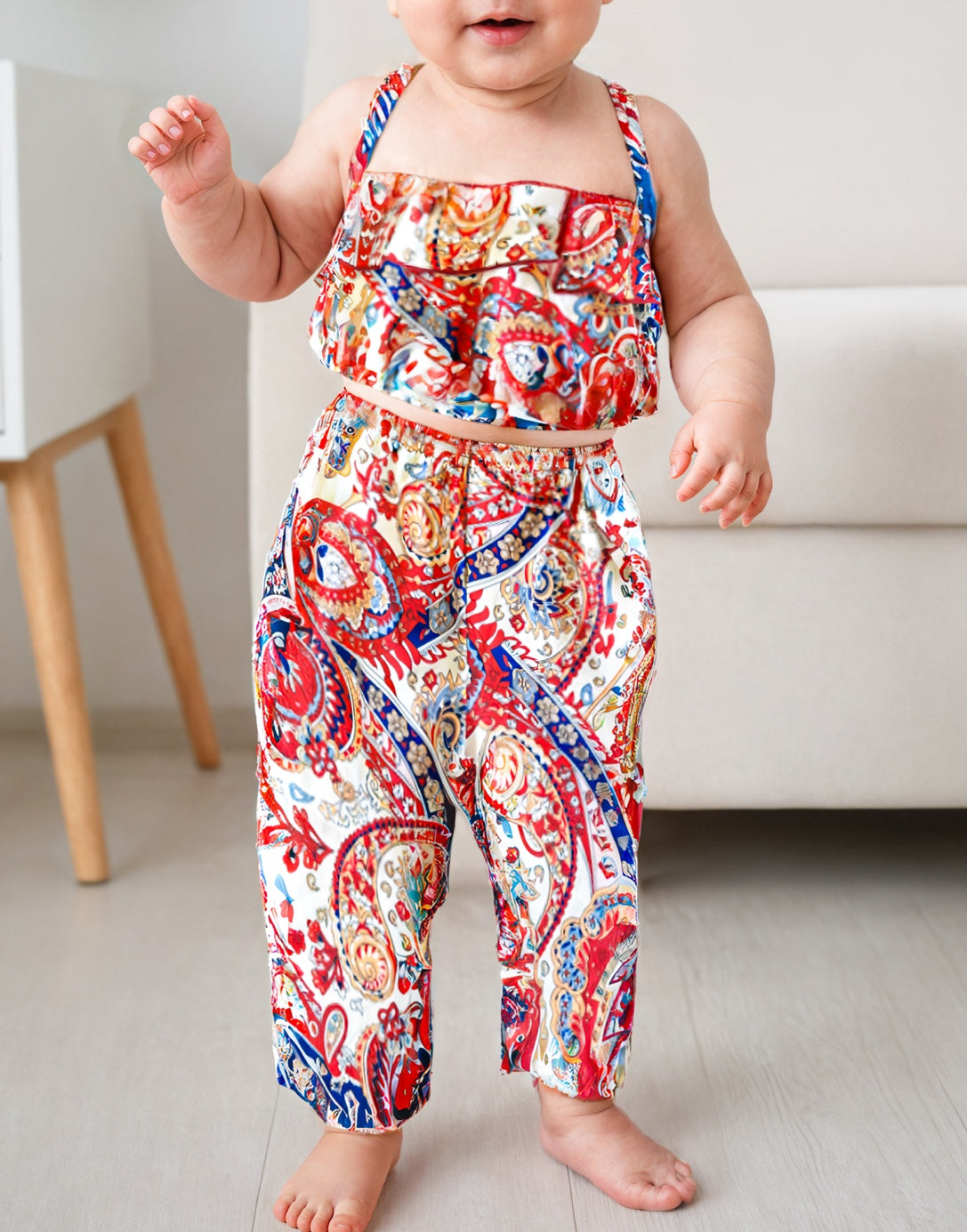 Closeup of Baby Girl Ruffle Hem Cami Top and Wide Leg Pants Set.