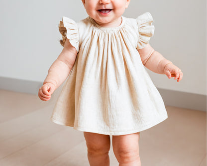 Front view of Baby Ruffle Sleeve Pleated Dress.