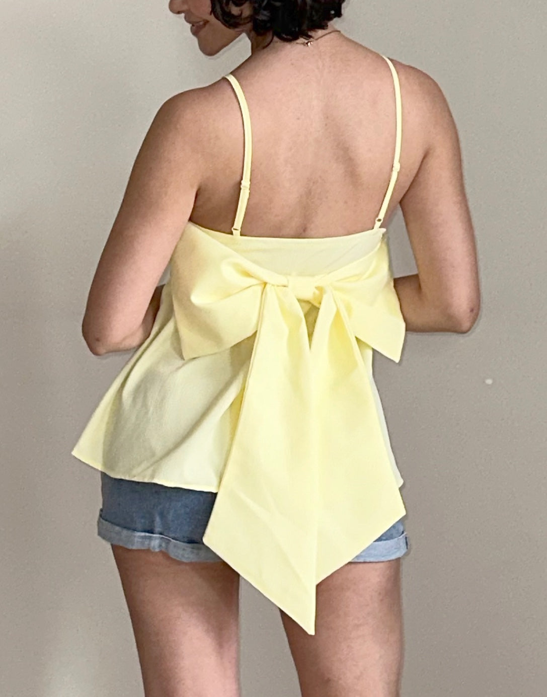 Back view of Bow Back Babydoll Cami Top.