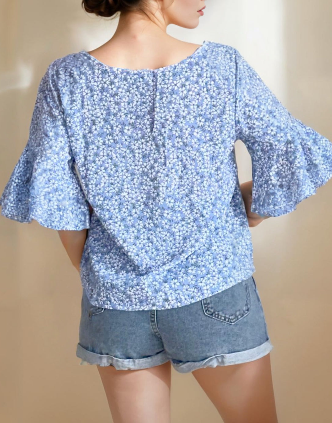 Back view of Flounce Sleeve Blouse.