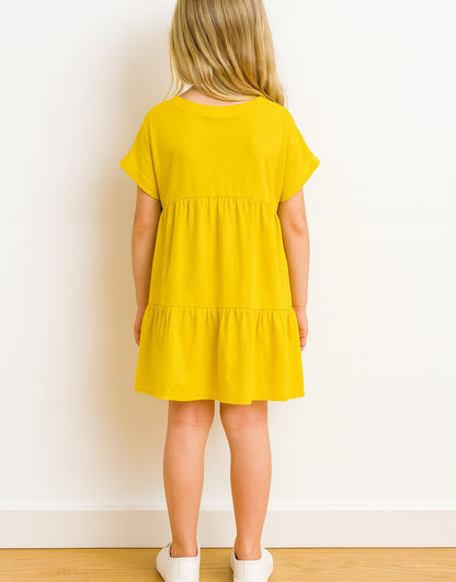 Back view of Girls Gathered Smock Dress.