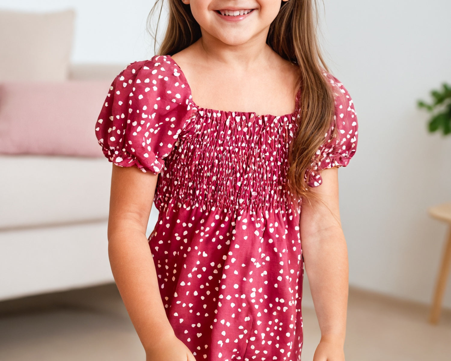 Front view of Girls Puff Sleeve Shirred Jumpsuit.