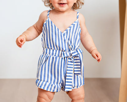 Front view of Girls Ruffle Hem Belted Cami Romper.