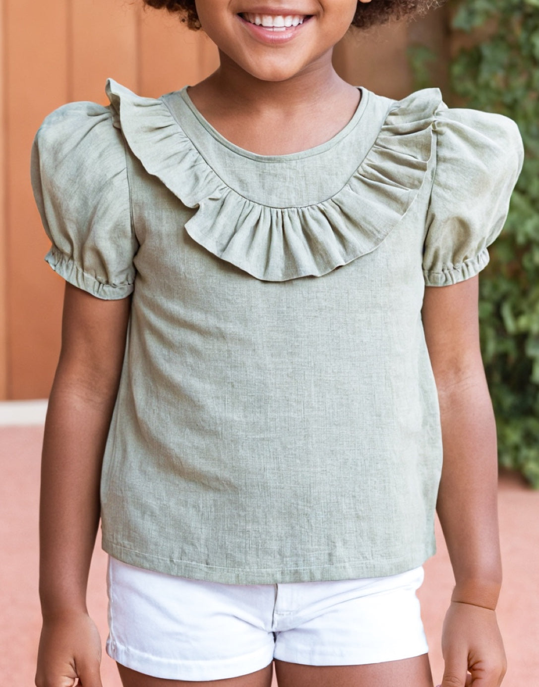 Front view of Ruffle Trim Puff Sleeve Blouse.
