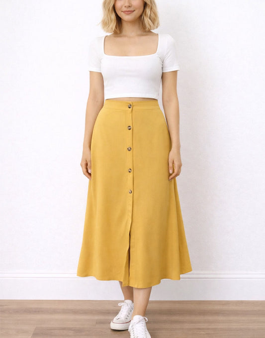 Woman wearing a white top and mustard yellow Button Front Midi Skirt on a white background