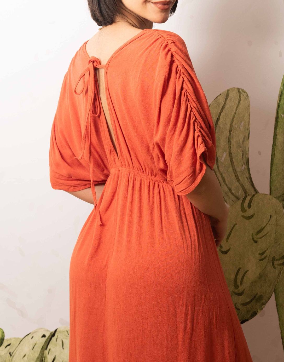 Side view of Kimono Sleeve Tie Back Maxi Dress .