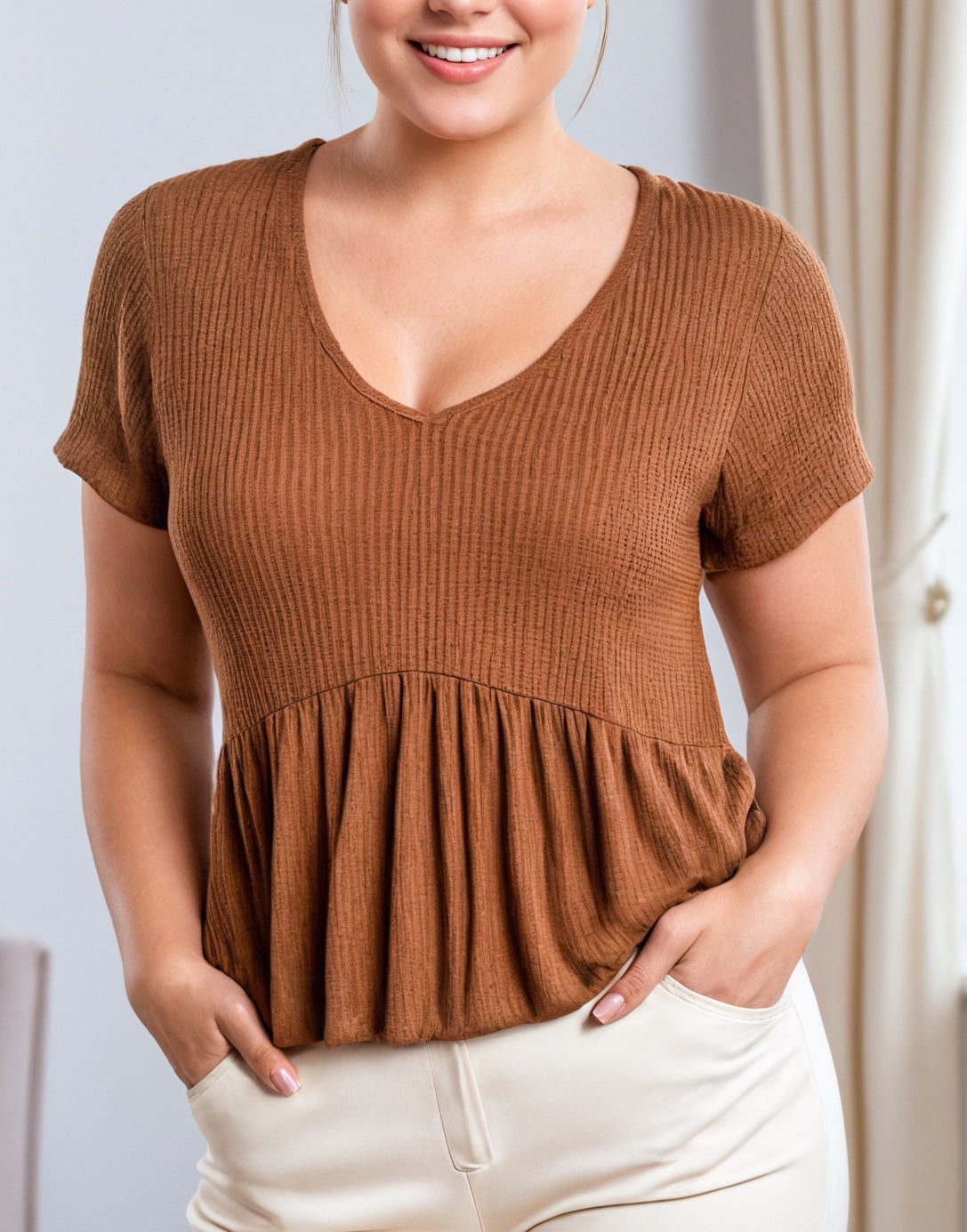 Front view of Plus Size Knit Peplum Top.