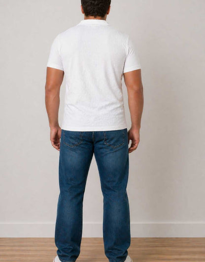 Back view of man wearing a white Plus Size Mens Knit Shorts Sleeve Polo Shirt with blue denim jeans on a white background.