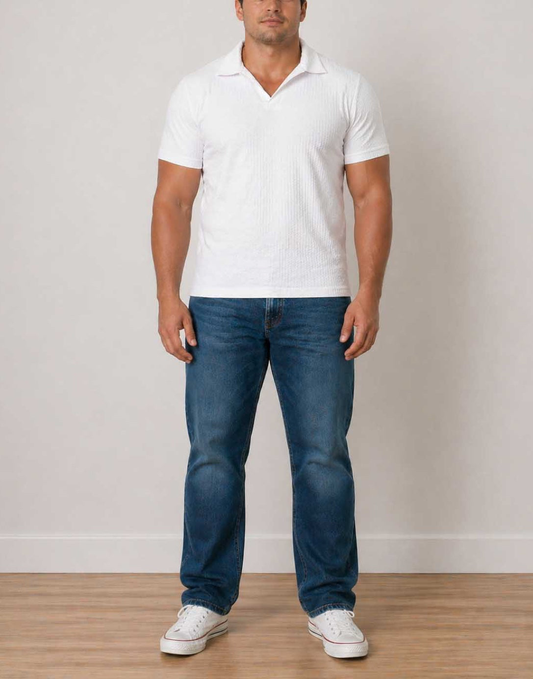 Man wearing a white Plus Size Mens Knit Shorts Sleeve Polo Shirt with blue denim jeans on a white background.