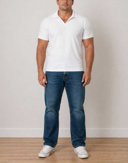 Man wearing a white Plus Size Mens Knit Shorts Sleeve Polo Shirt with blue denim jeans on a white background.