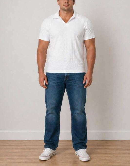 Man wearing a white Plus Size Mens Knit Shorts Sleeve Polo Shirt with blue denim jeans on a white background.