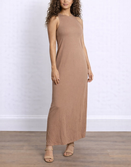 Side view of woman wearing a long brown Round Neck Tank Maxi Dress against a white background.